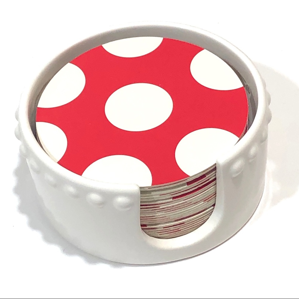 Set of coasters in white ceramic holder
